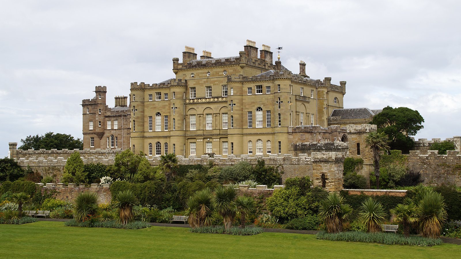 Culzean Castle exterior with gardens and coastal walls under overcast sky