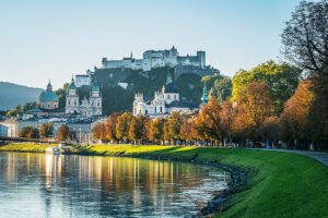 Fortress Hohensalzburg above Salzburg skyline and Salzach river