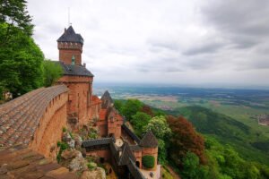 Haut-Koenigsbourg Castle perched on a hill overlooking Alsace plains