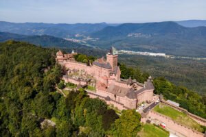 Aerial view of Haut-Koenigsbourg Castle on a forested Vosges hill