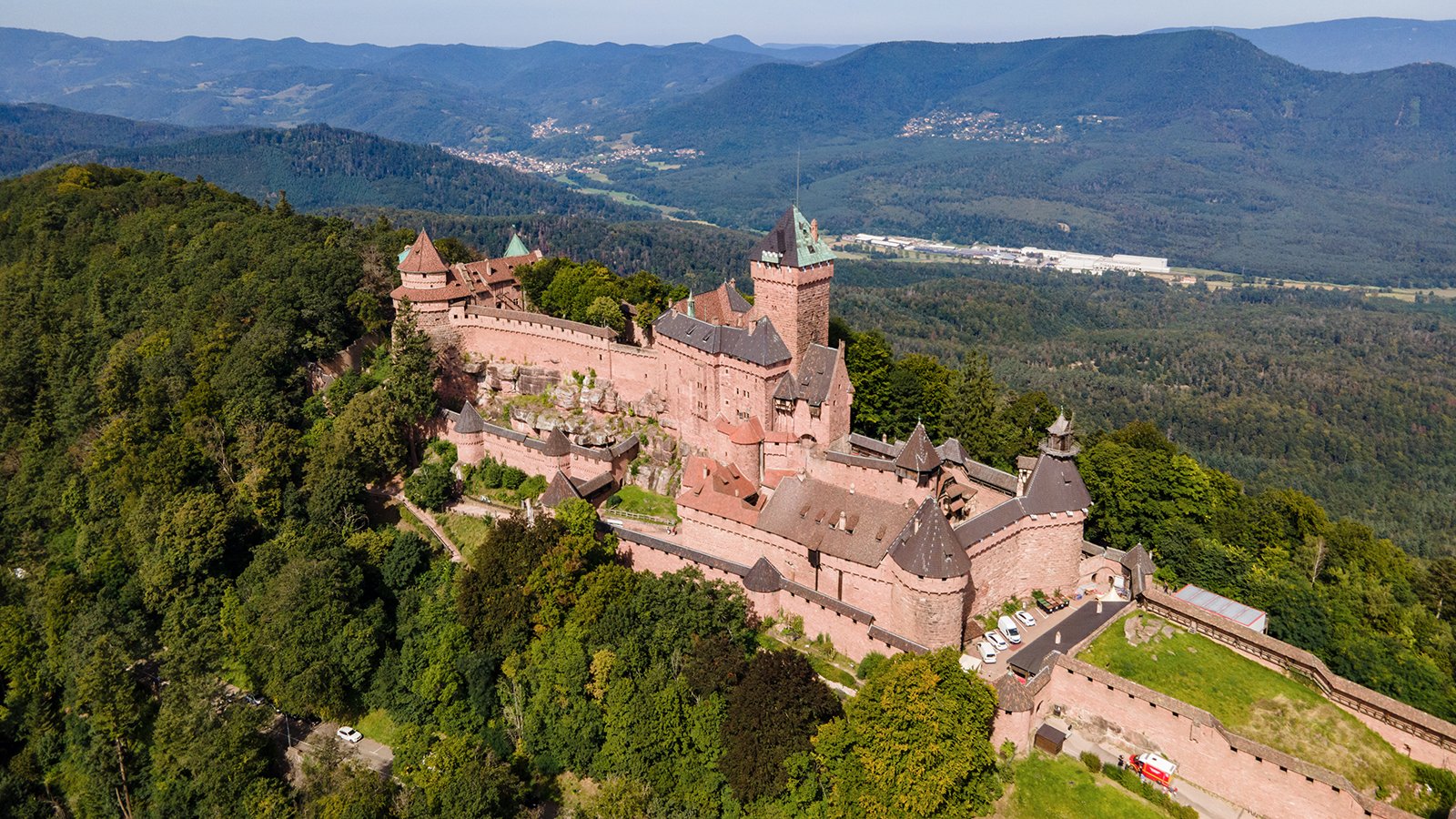 Aerial view of Haut-Koenigsbourg Castle on forested Vosges hill