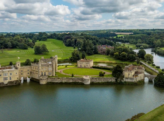 Aerial view of Leeds Castle on island surrounded by moat