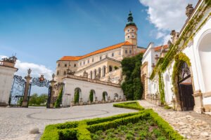 Mikulov Castle above cobbled courtyard and ornate gates