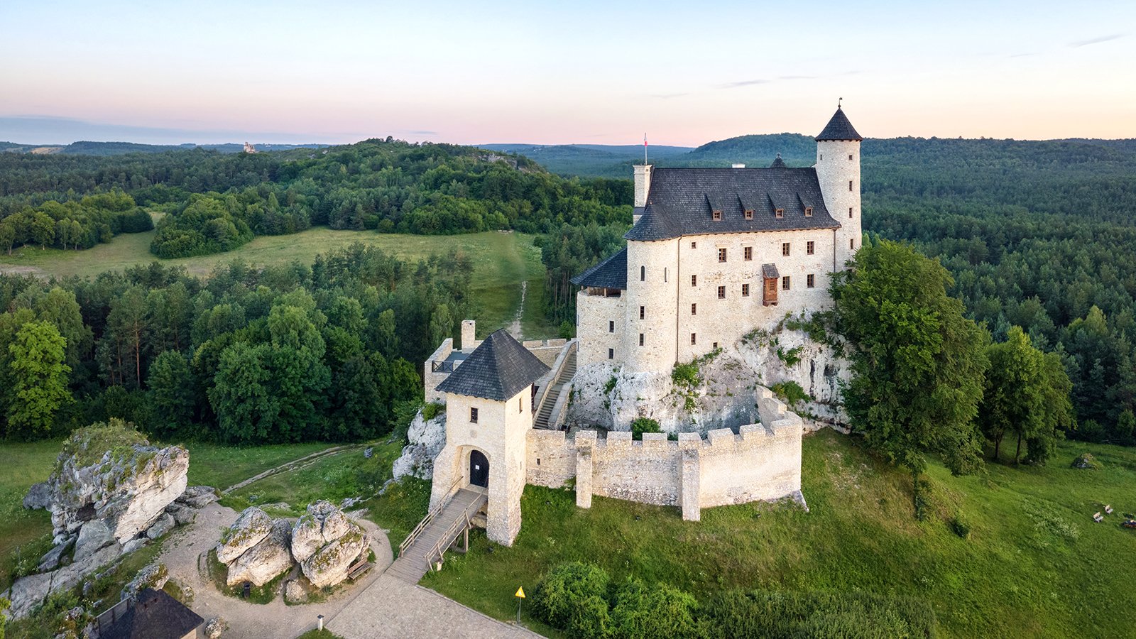 Aerial view of Bobolice Castle on limestone hill