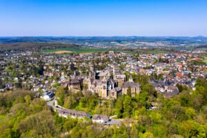 Aerial view of Braunfels Castle on wooded hill