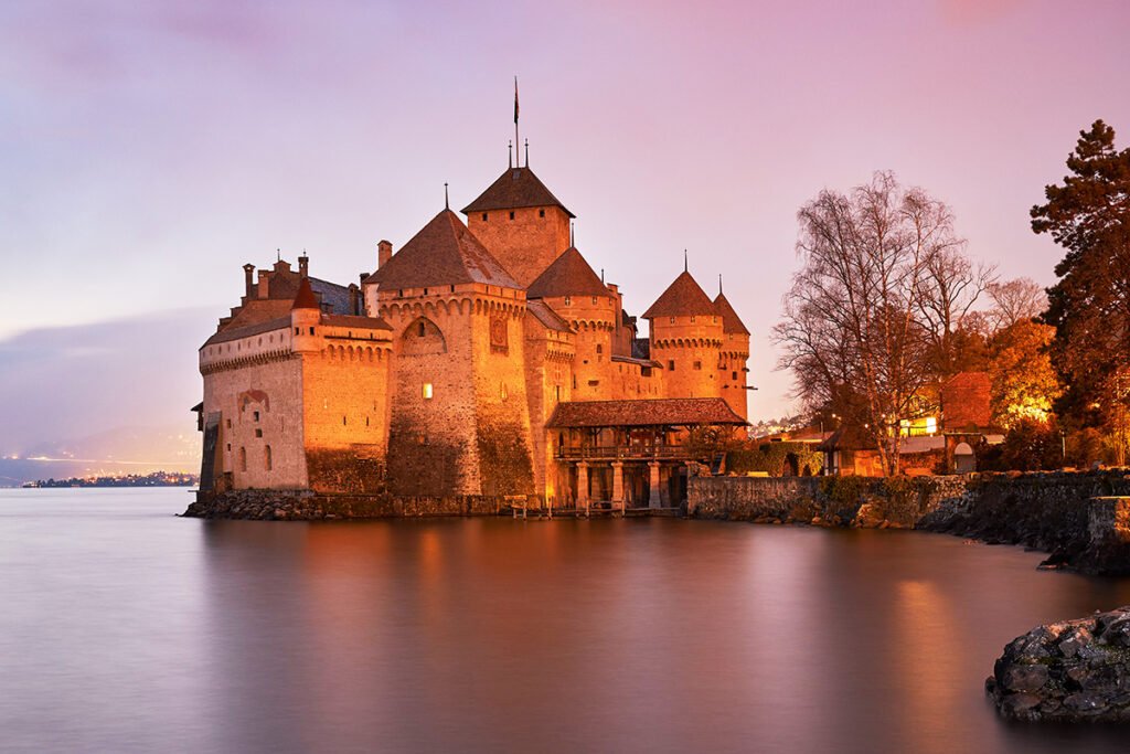 Chillon Castle on Lake Geneva at dusk