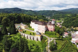 Aerial view of Jansky Vrch Castle above forested valley