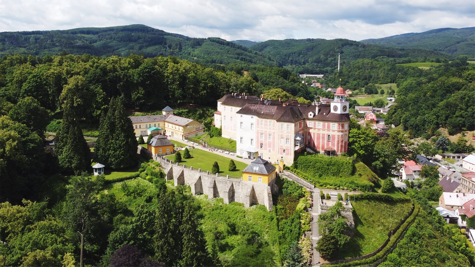 Aerial view of Jansky Vrch Castle on green hill