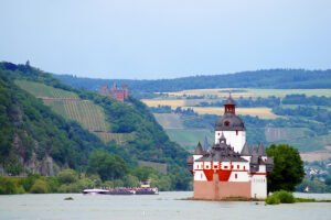 Pfalzgrafenstein Castle island fortress on the Rhine with barge passing