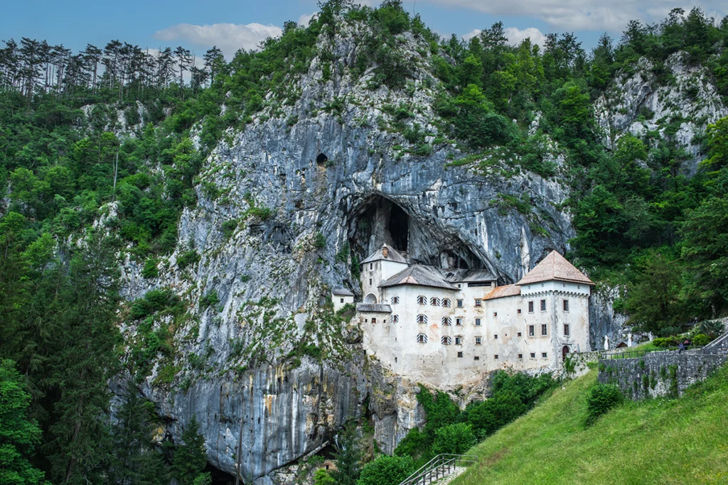 Predjama Castle built into a rocky cave cliff