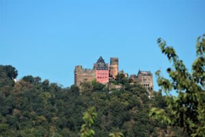 Schönburg Castle perched above forested Rhine valley