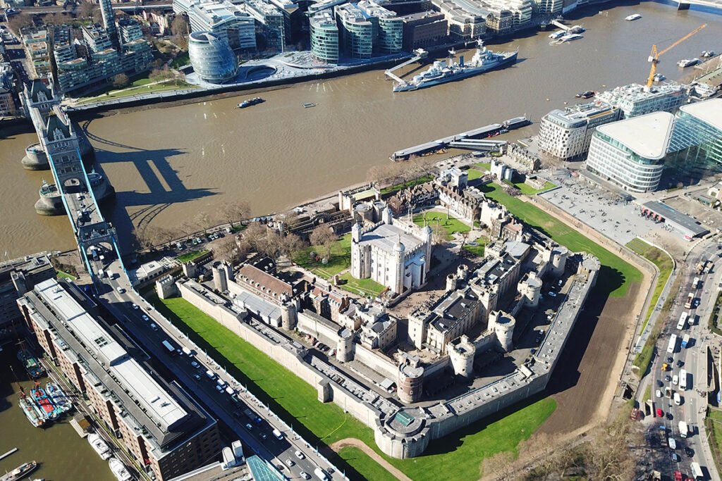 Aerial view of The Tower of London beside the River Thames