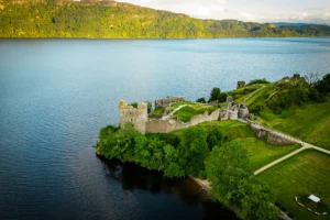 Aerial view of Urquhart Castle ruins beside Loch Ness