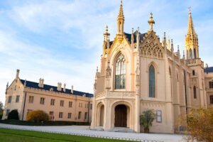Lednice Castle ornate Gothic chapel exterior at golden hour
