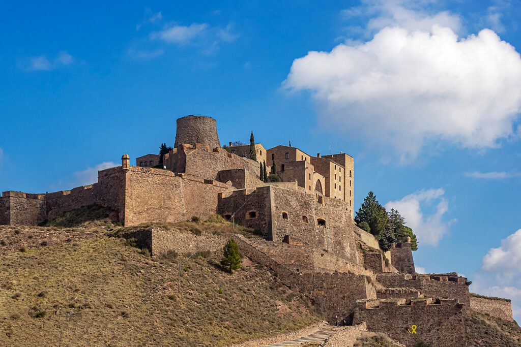 Parador de Cardona fortress on hill under blue sky