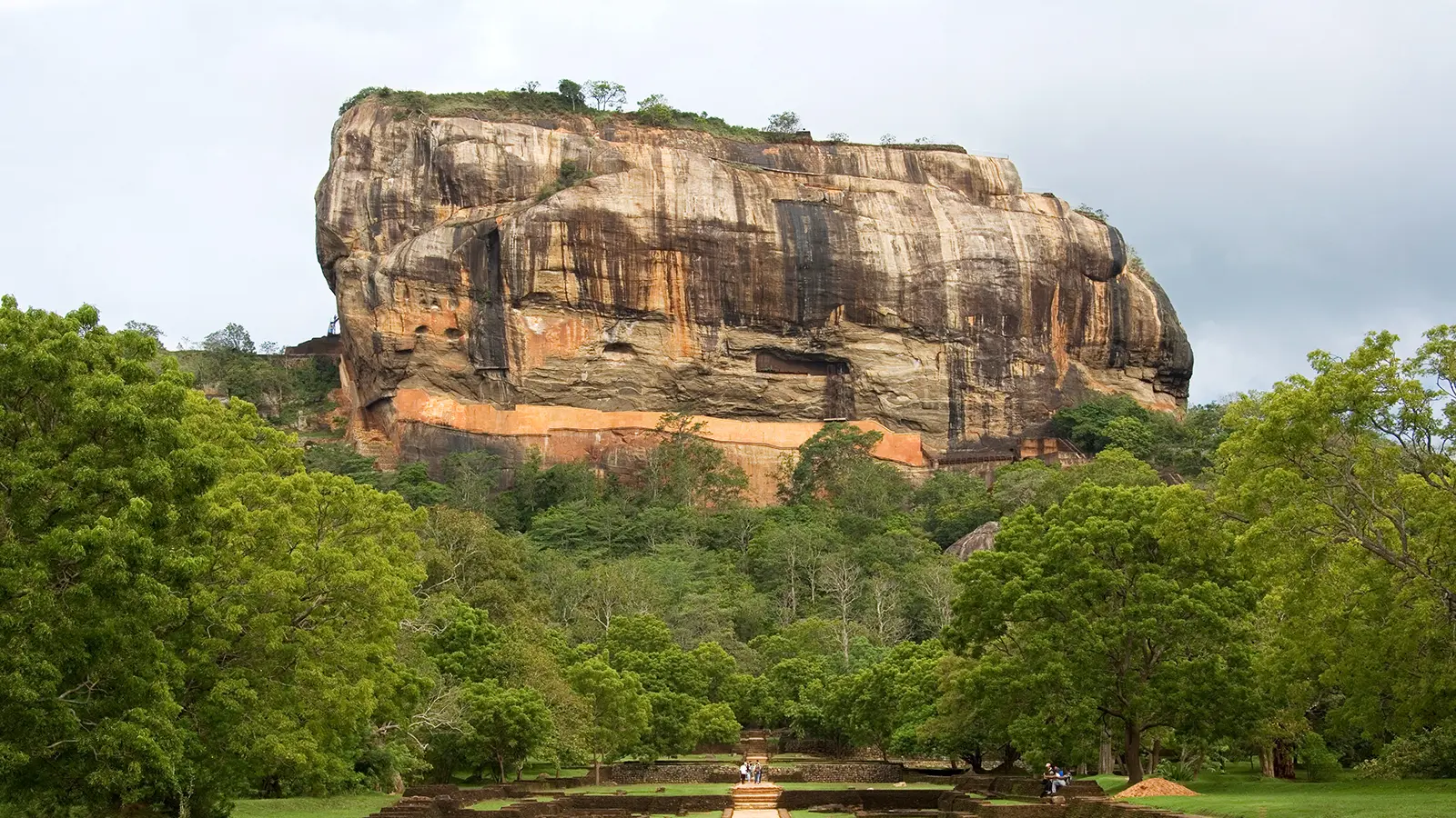 View of Sigiriya rock fortress rising above jungle