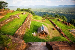 Aerial view of Sigiriya ruins and lush forest