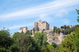 Château de Beynac perched on limestone cliff